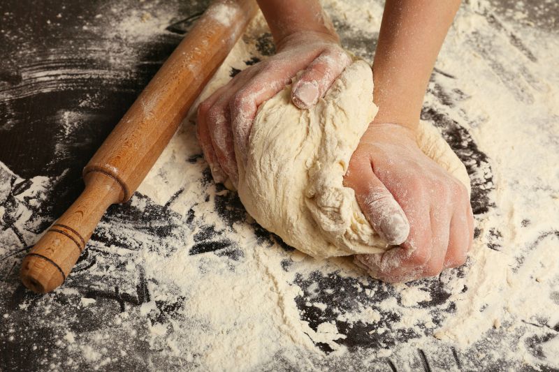 woman makes bread