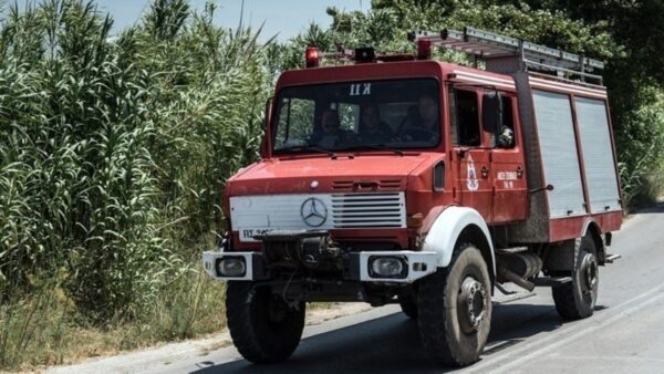 a red truck on a road