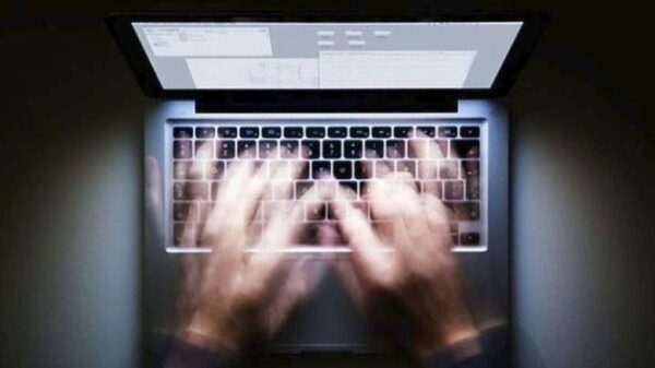 hands on a laptop keyboard