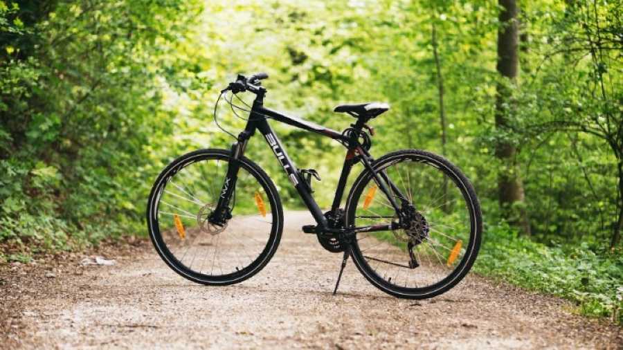 a bicycle on a dirt path